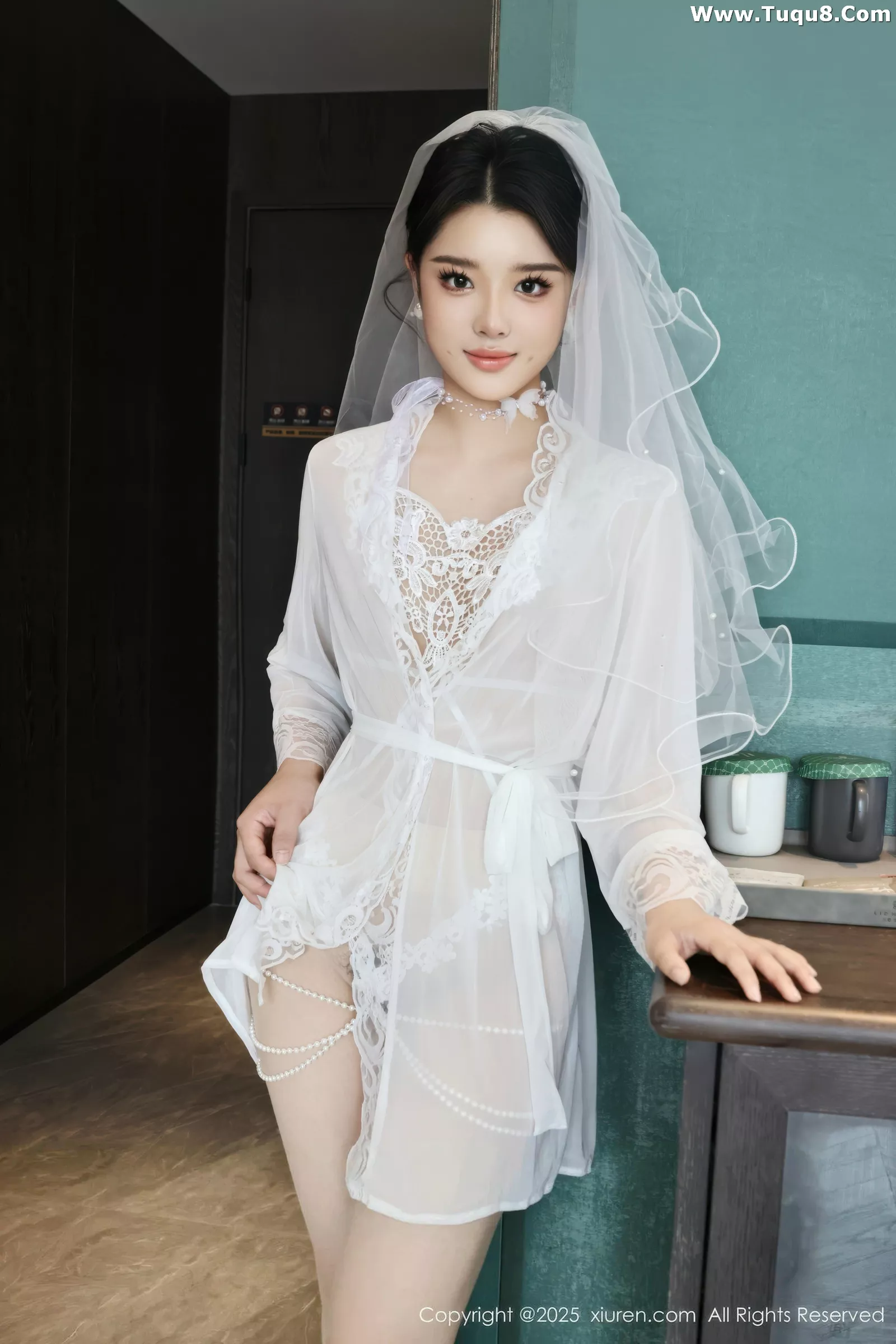   [XiuRen]高清写真图 2025.07.18 No.10559 糯梨子 白色婚纱第5张图片