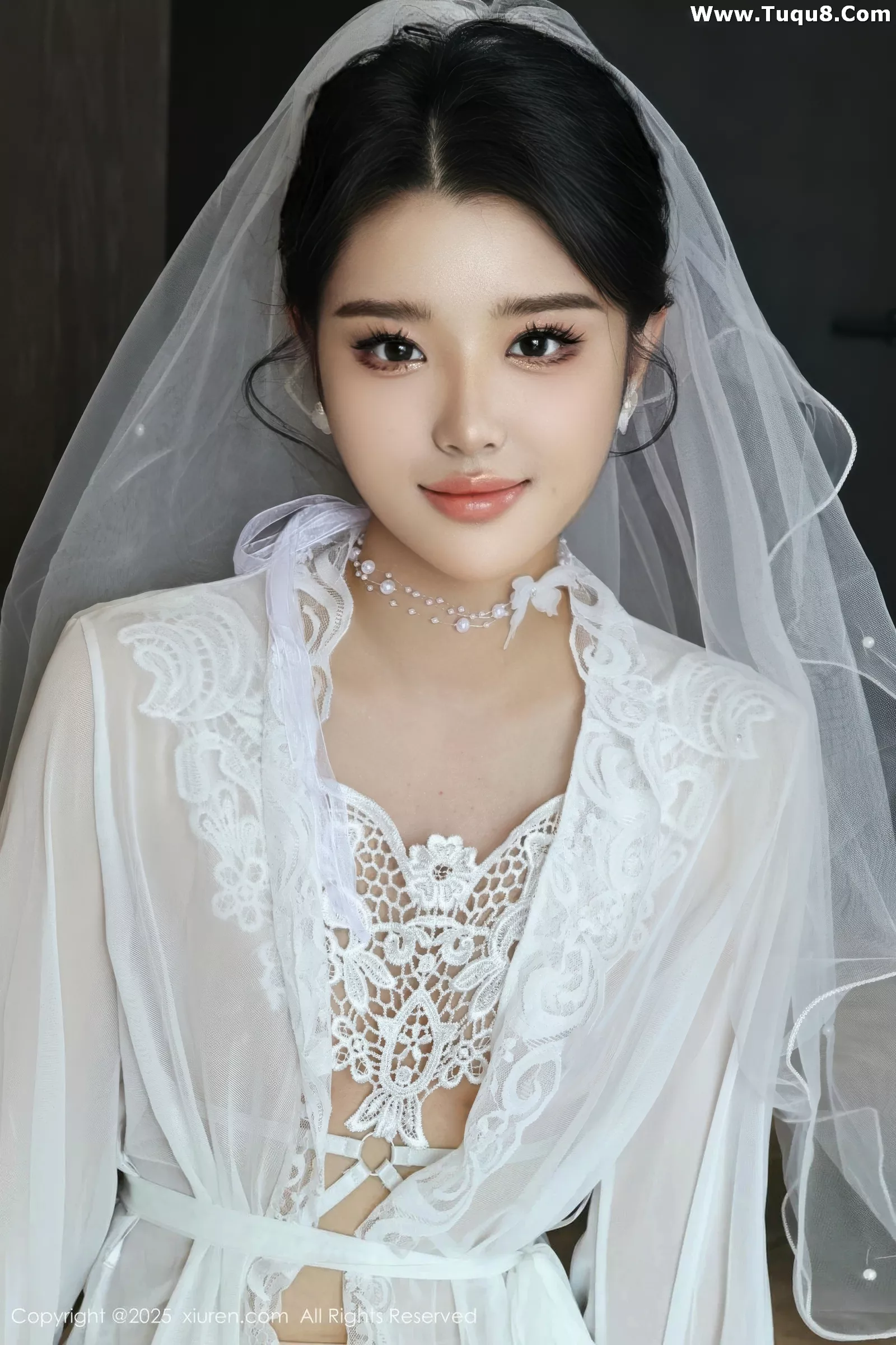   [XiuRen]高清写真图 2025.07.18 No.10559 糯梨子 白色婚纱第9张图片