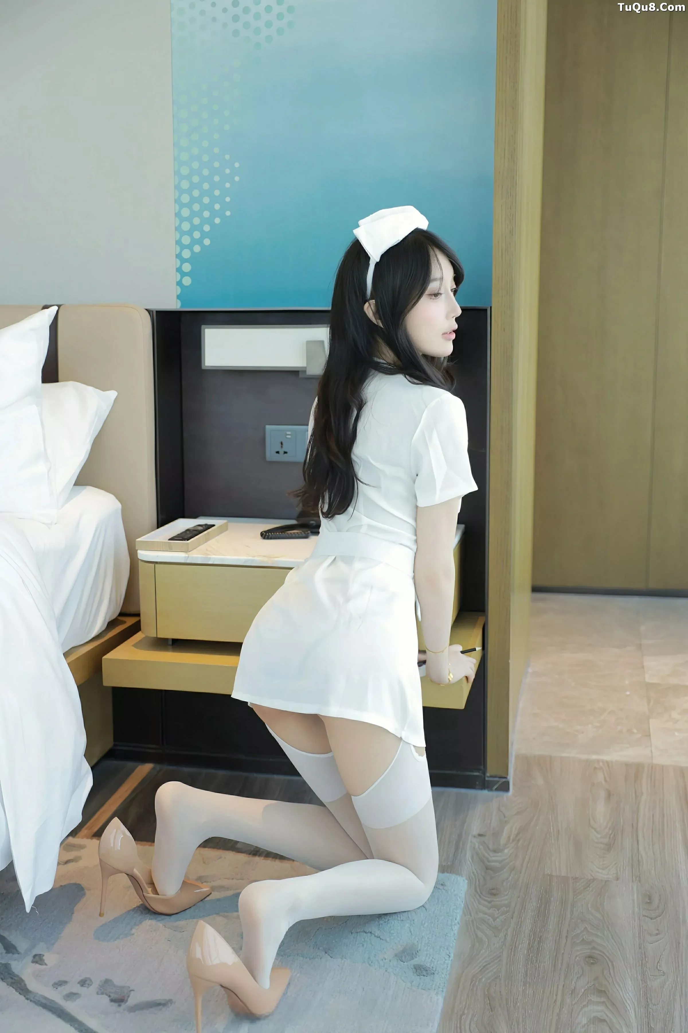 玥儿玥  [XiuRen]高清写真图 2025.07.04 No.10507 玥儿玥er 白色护士第6张图片