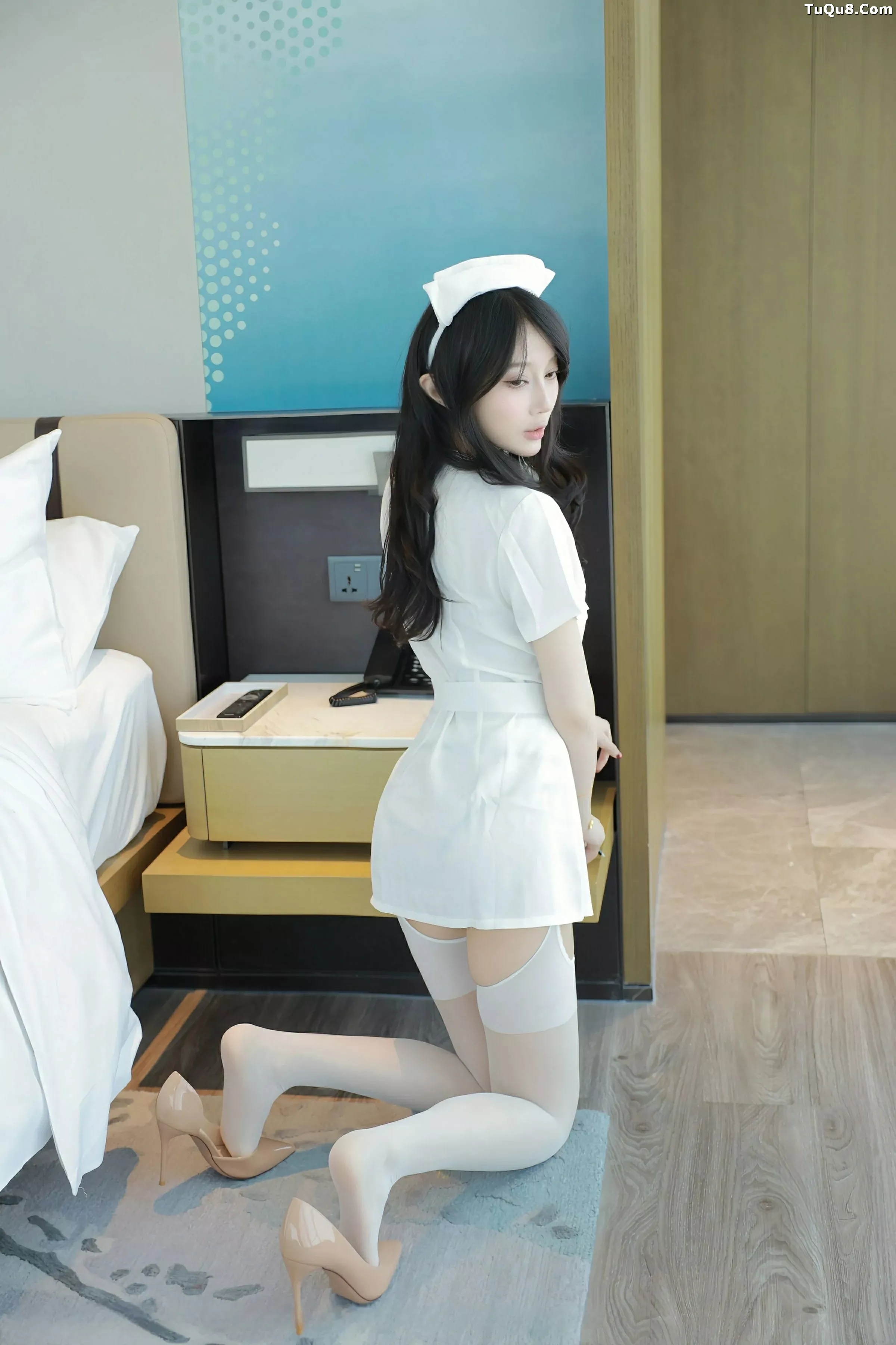 玥儿玥  [XiuRen]高清写真图 2025.07.04 No.10507 玥儿玥er 白色护士第7张图片